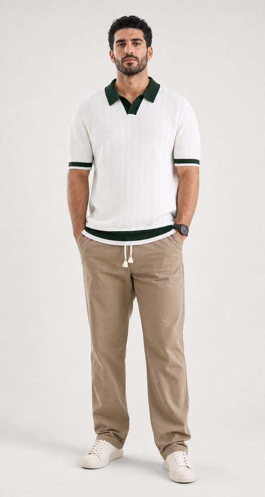 Model wearing Le Vernon Polo in White